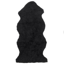 SkinnWille Skinnwille korthårigt fårskinn Curly svart 135cm